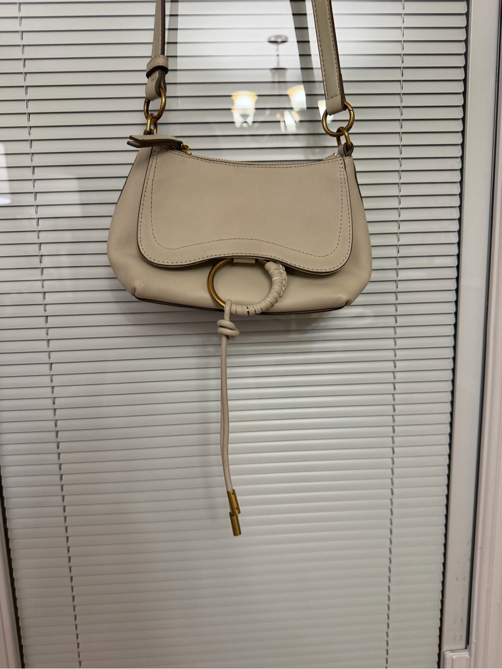Dolce Vita Ivory Crossbody Bag with Gold Ring Accent